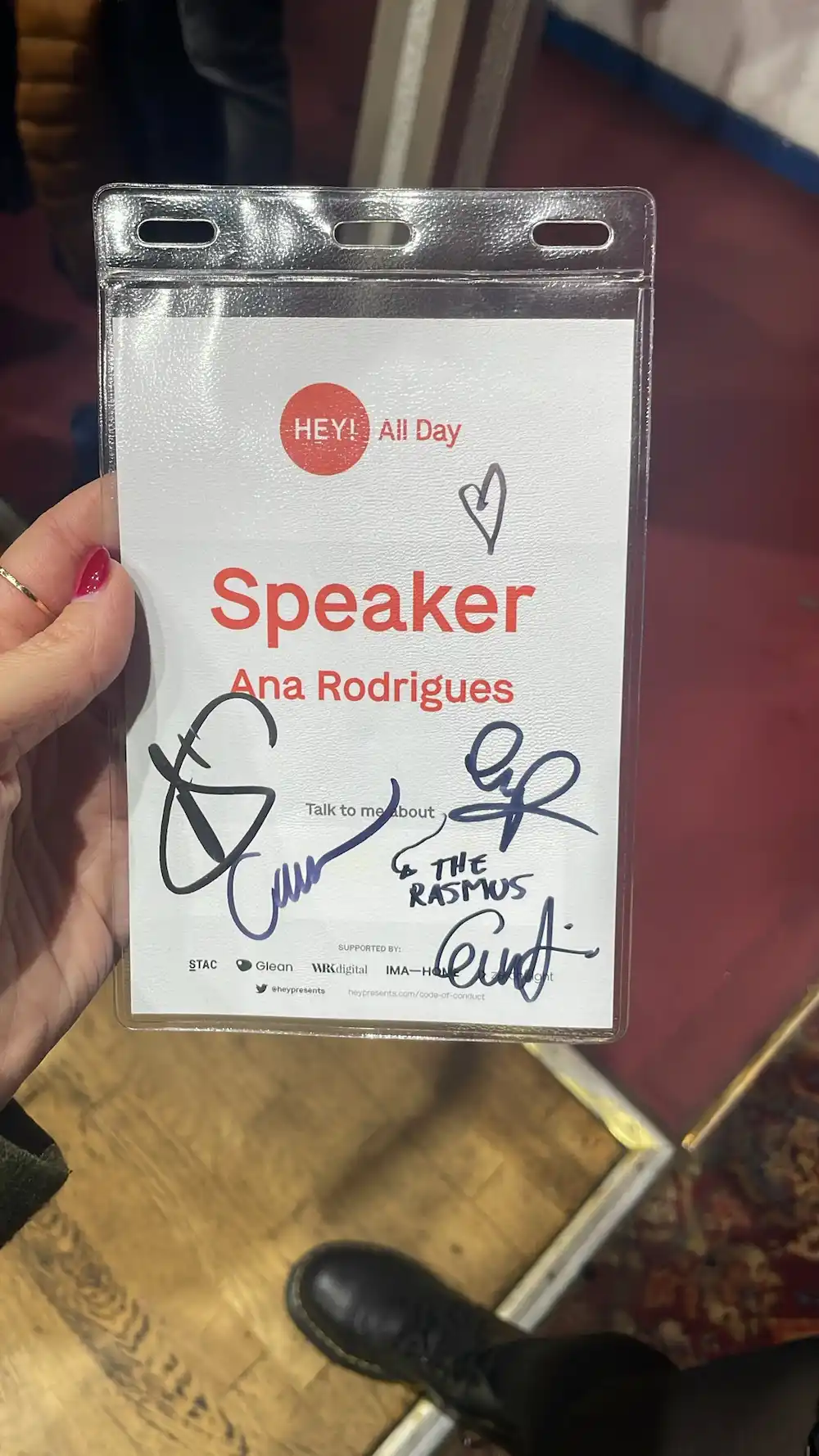 All Day Hey landyard with the autographs of the band members.